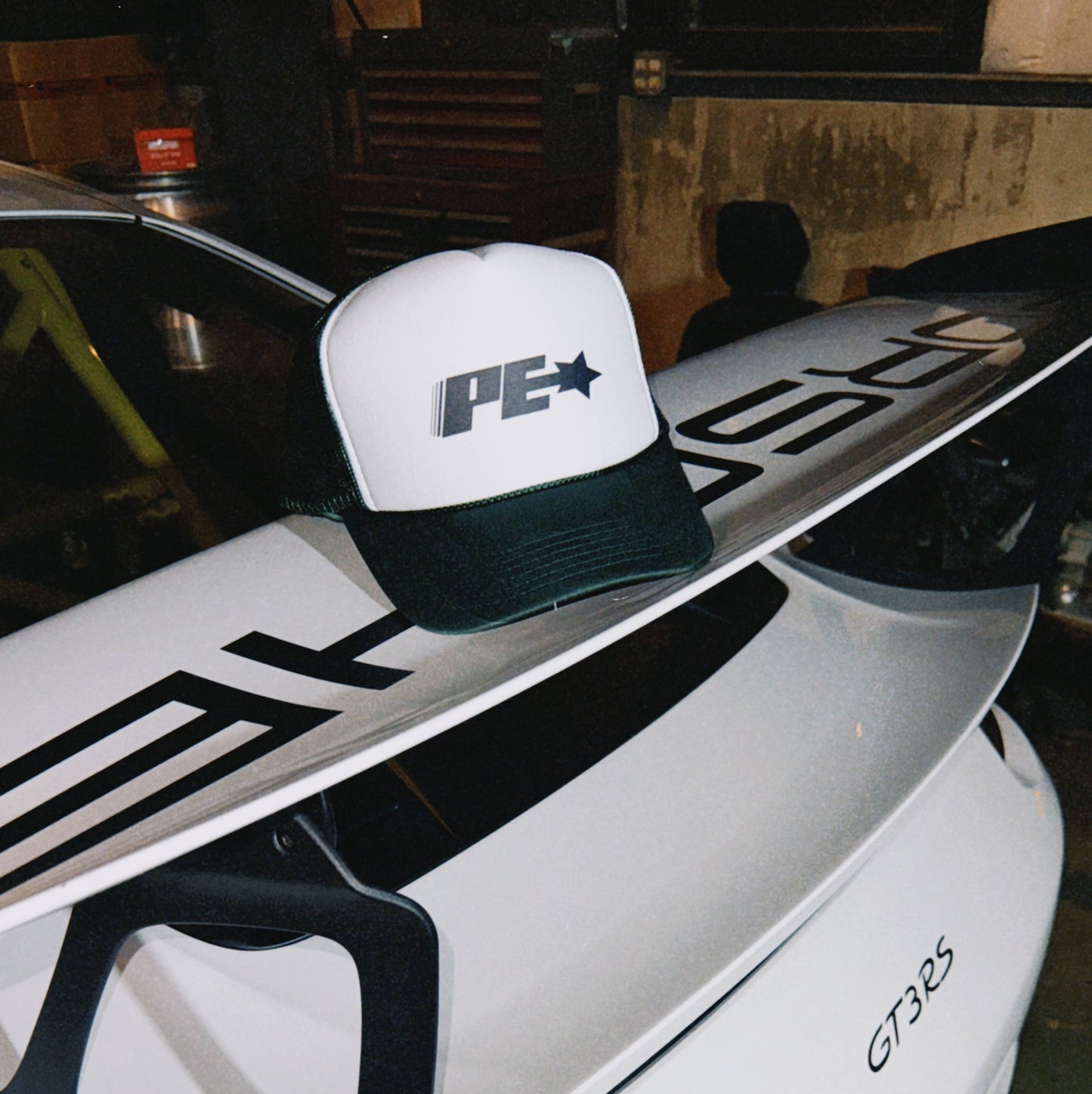 VINTAGE PE* LOGO TRUCKER LID